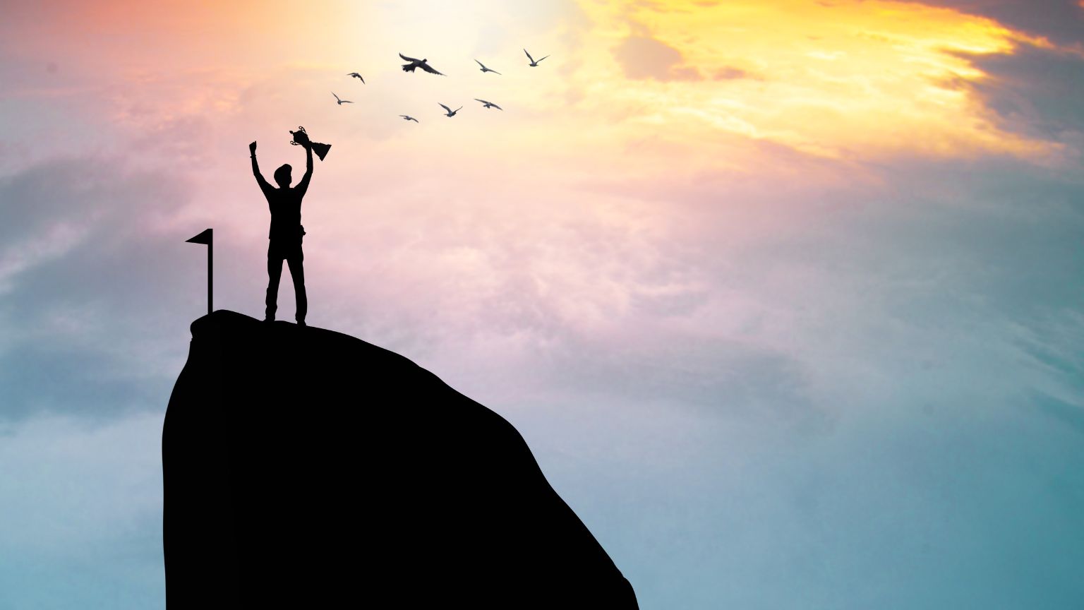 Silhouette of a person holding a trophy on a mountain peak at sunrise, symbolizing personal achievement and breaking a world record